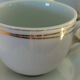 Set de 4 tasses blanches et or en porcelaine