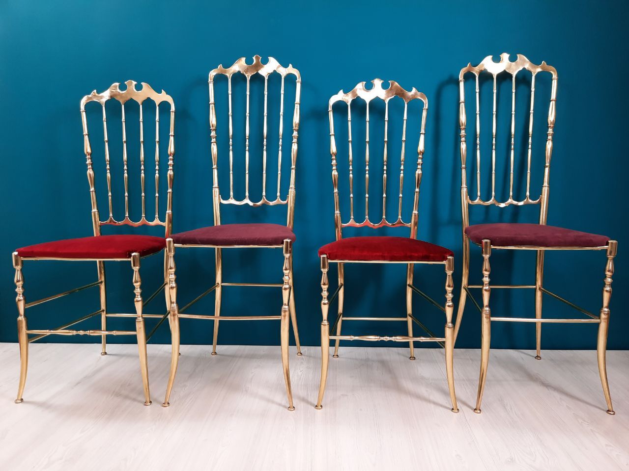 Pair of chiavarine chairs, brass