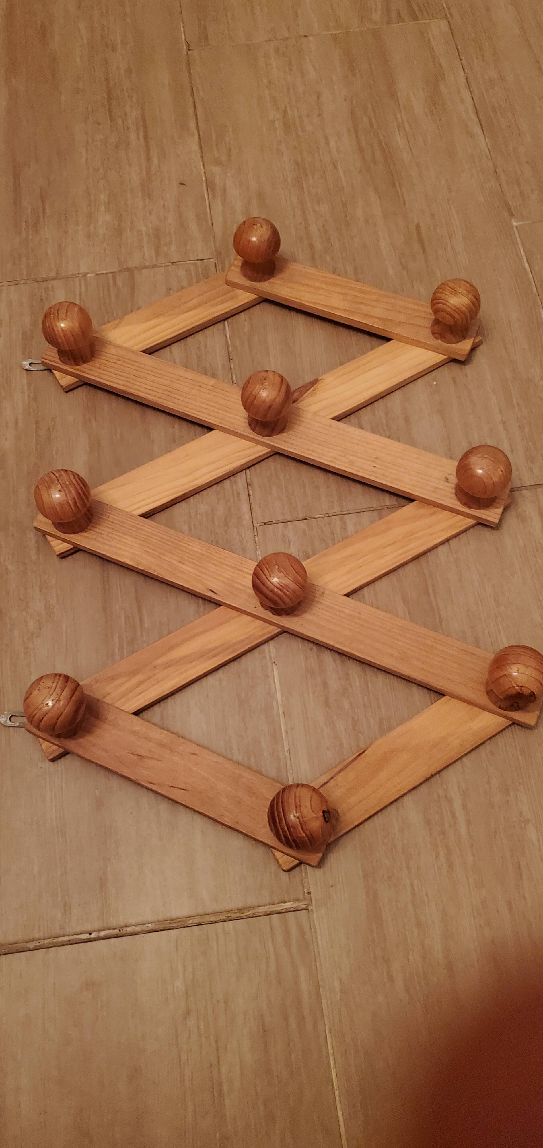 Accordion wall coat rack