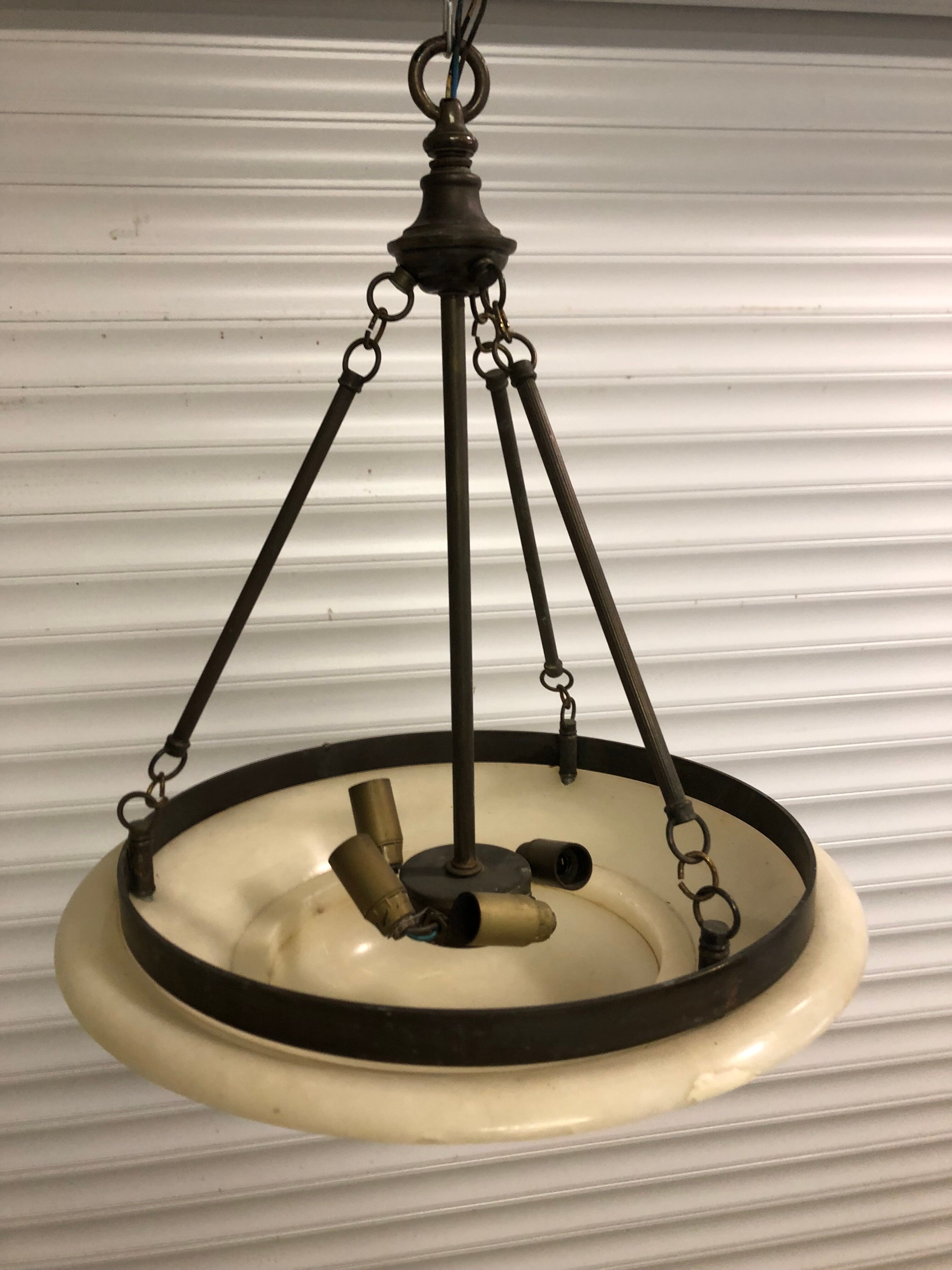 Chandelier in white alabaster and antique brass.