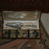 Cake shovel and twelve silver metal dessert forks