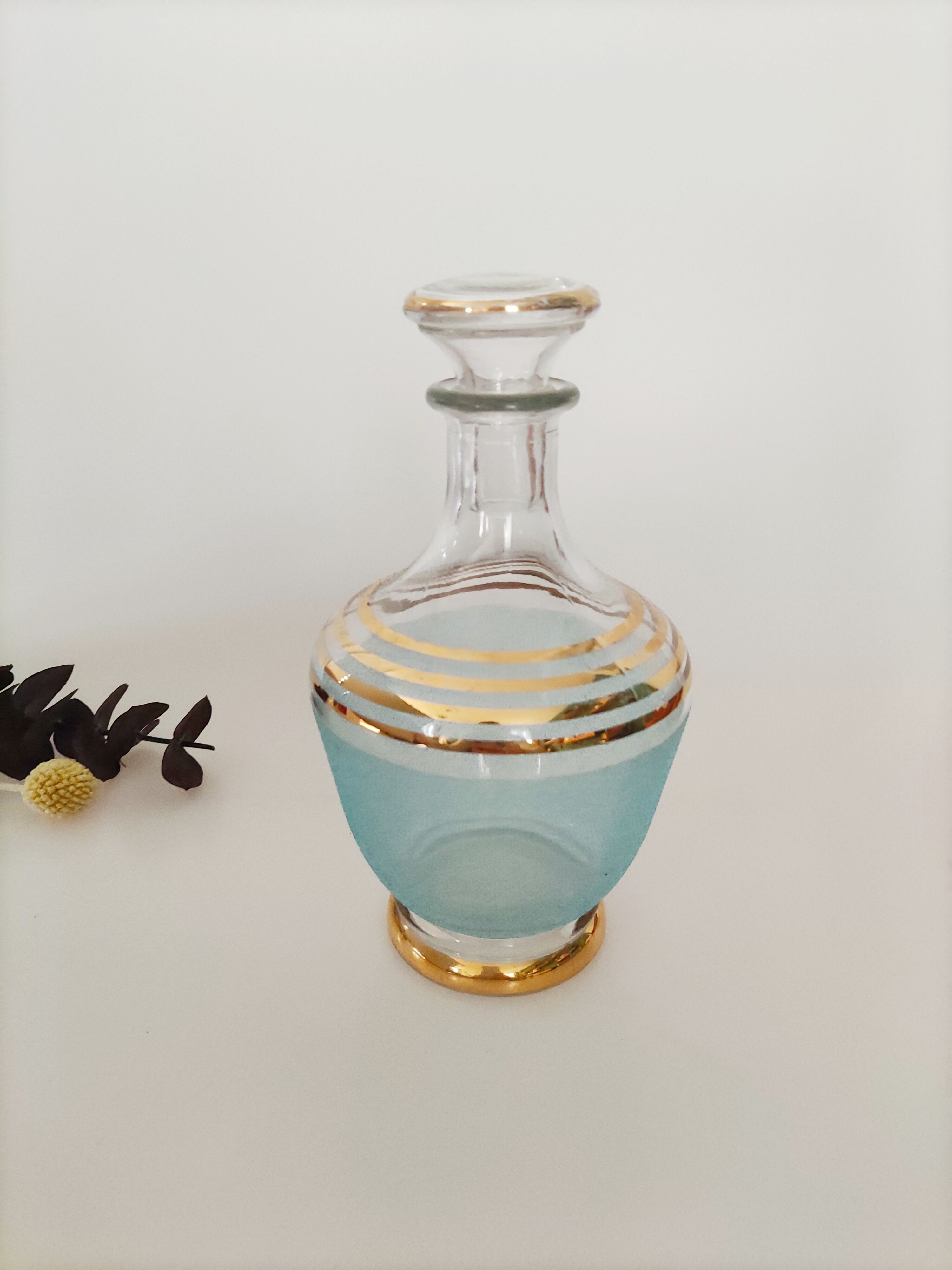 Blue and gold glass decanter