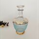 Blue and gold glass decanter