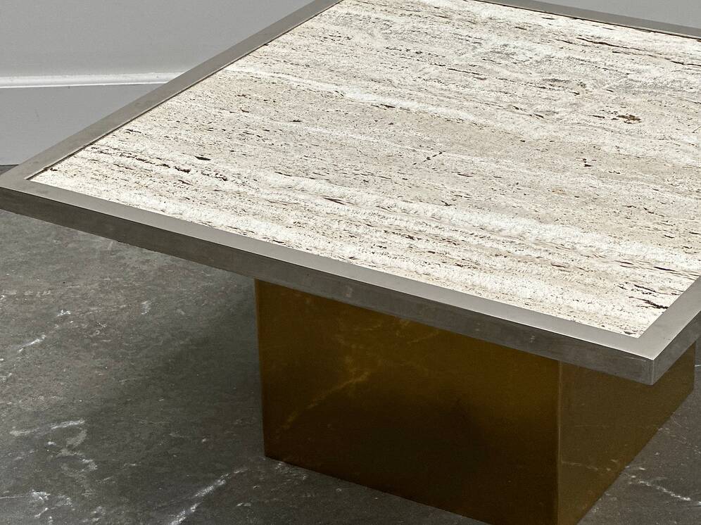 Brute travertine coffee table with brass base and chrome edges, France 1970s.