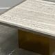 Brute travertine coffee table with brass base and chrome edges, France 1970s.