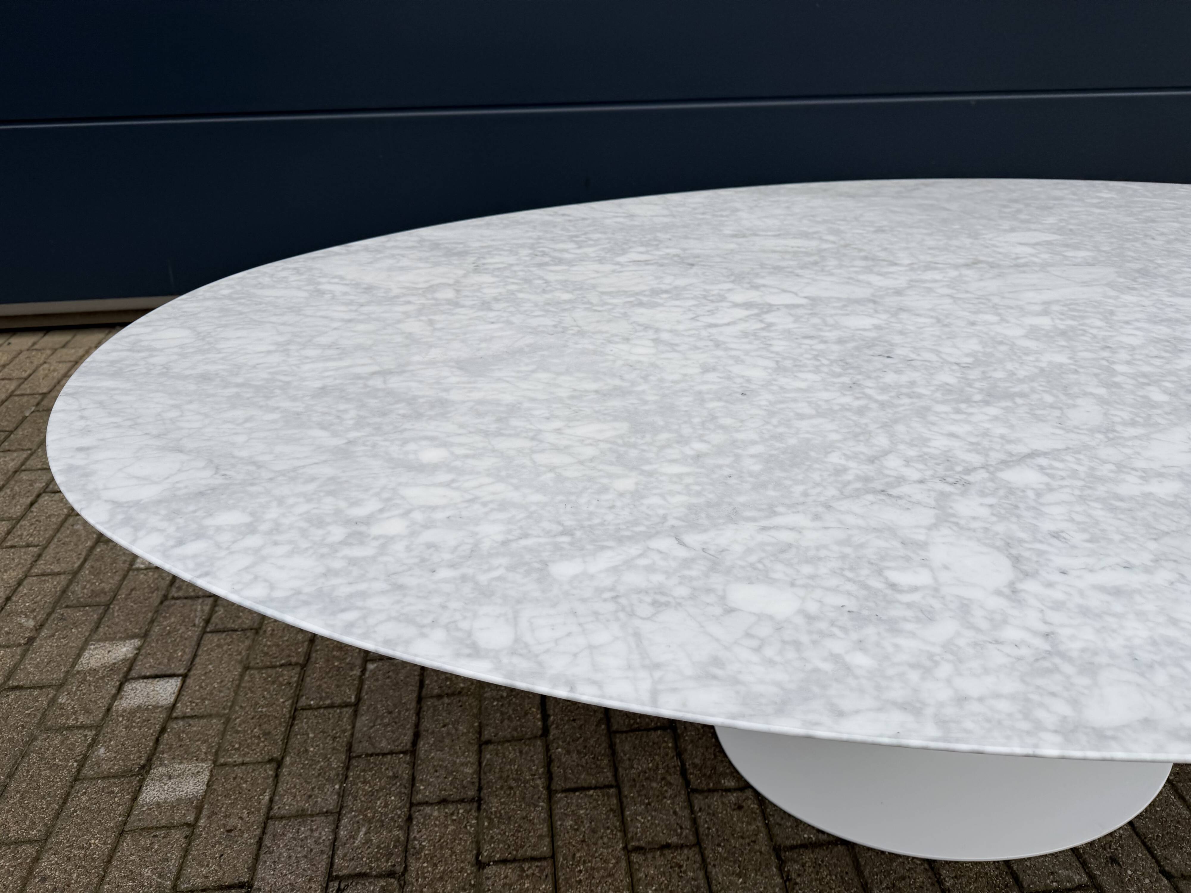 Original Knoll Tulip oval dining table (244cm) in Carrara marble.