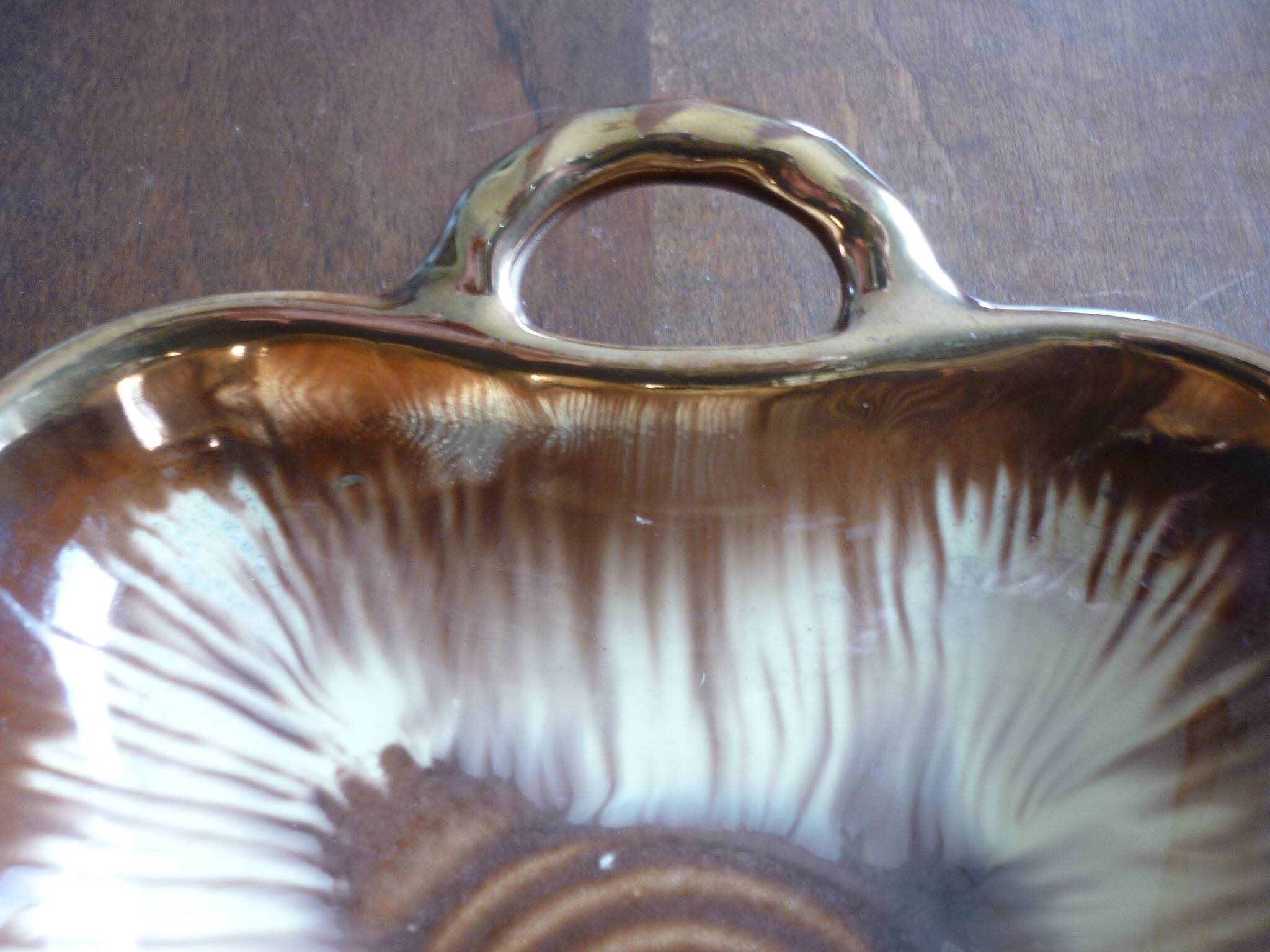 Square dish with brown and gold handles