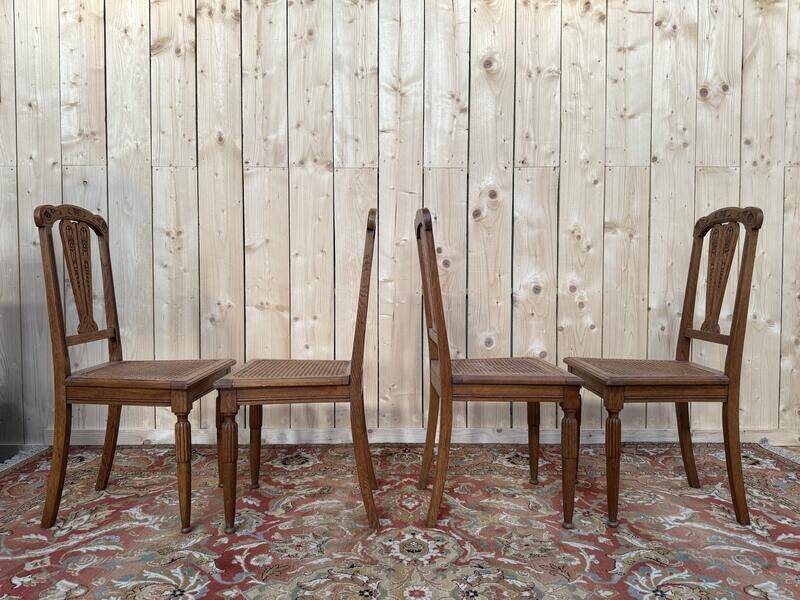 Suite de 4 chaises époque Art Déco en cannage