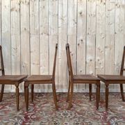 Suite de 4 chaises époque Art Déco en cannage