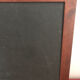 Rectangular wooden frame with slate black background