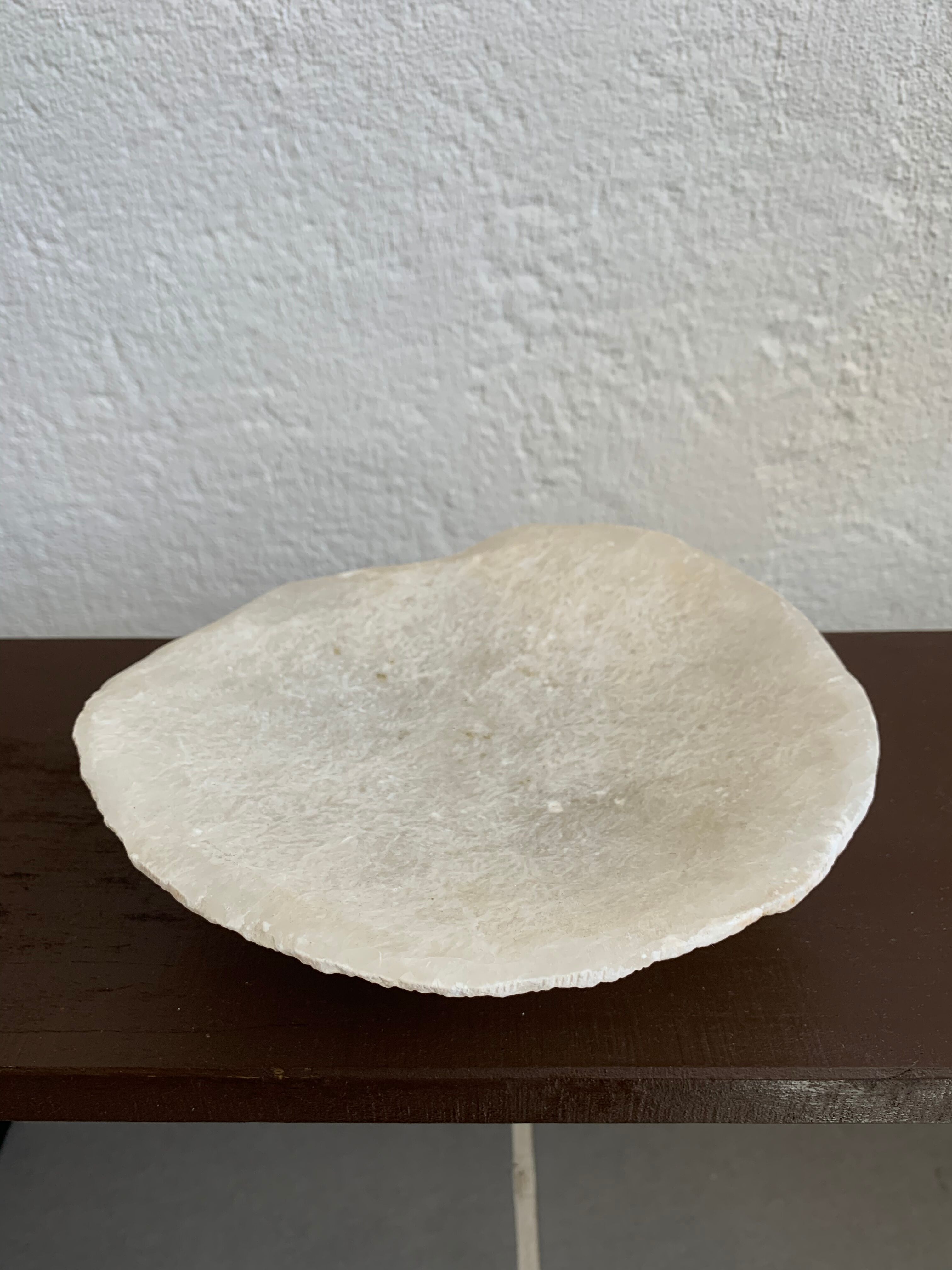 Empty pocket in vintage alabaster