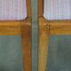 Set of 2 vintage dining chairs from the 1970s with spindle backrest and fabric seat