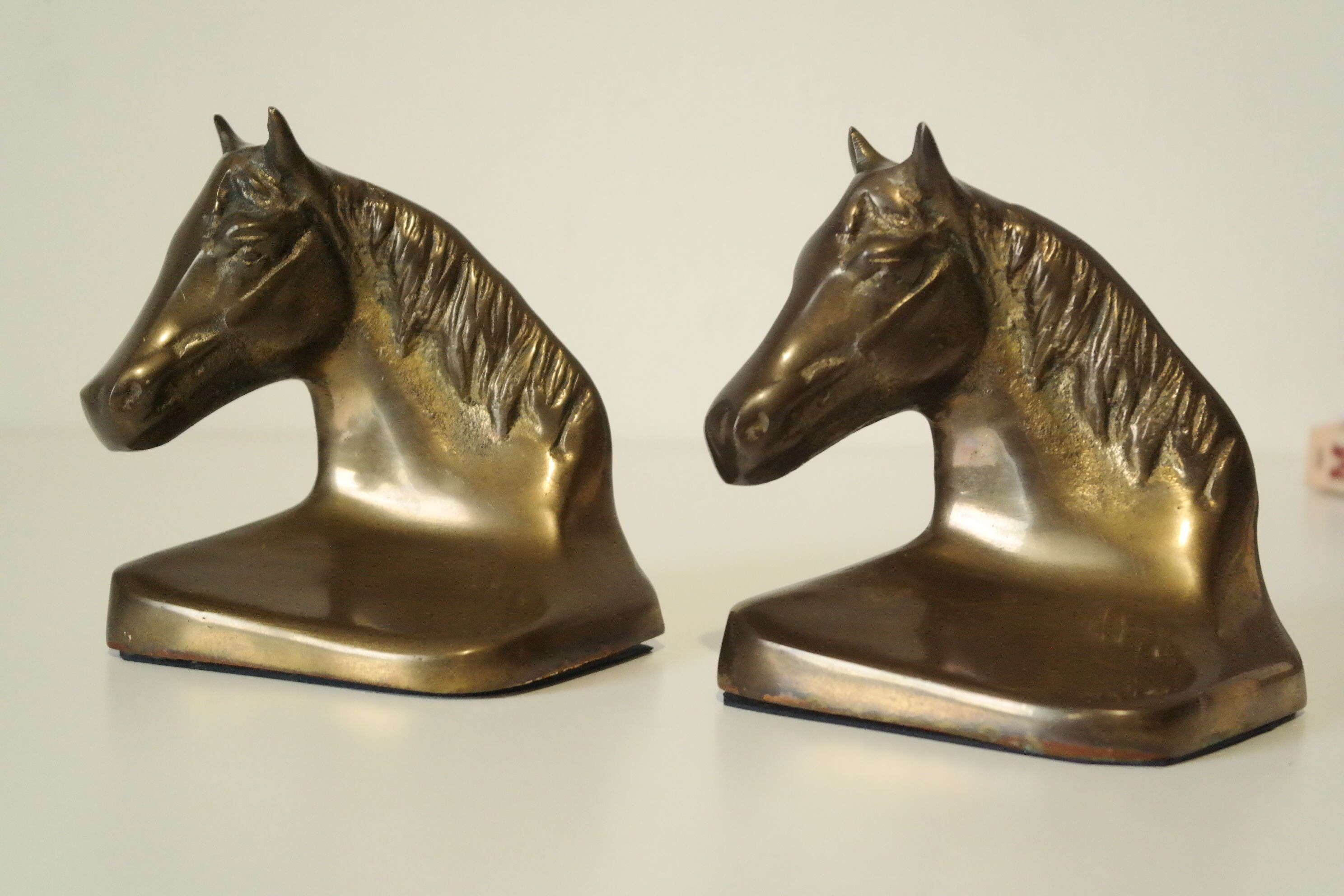 Pair of bookends plaster horses effect vintage brass
