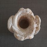 Candlestick in carved stone, signed