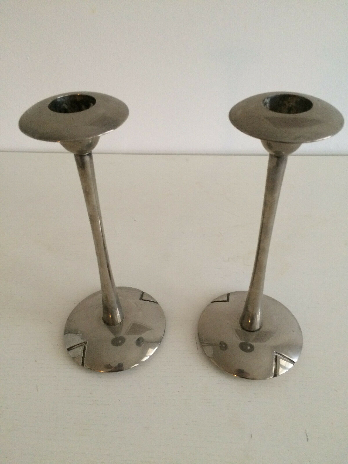Pair of silver style Deco candlesticks