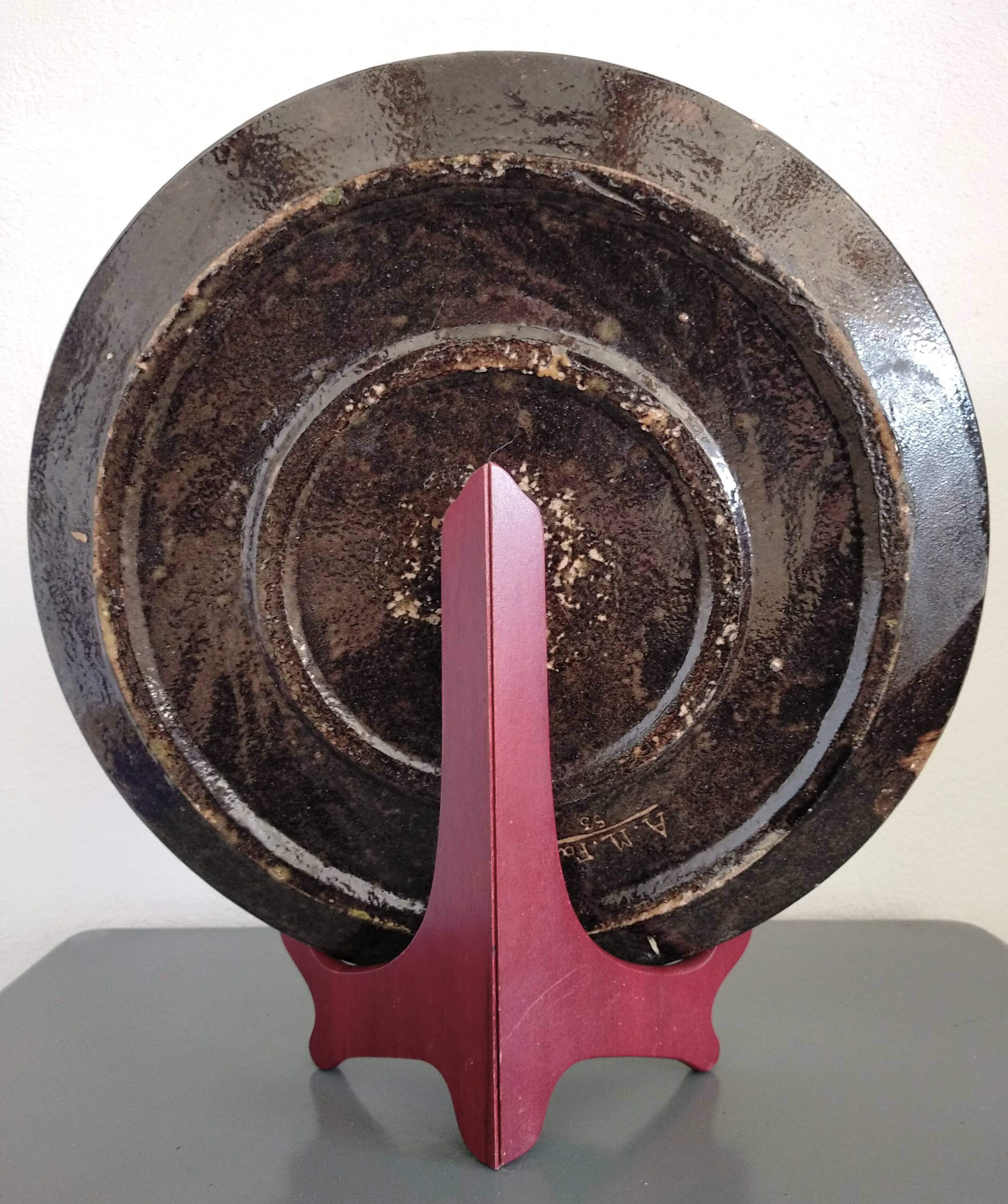 Glazed earthenware dish from Dauphiné signed A.M. Faure 1953