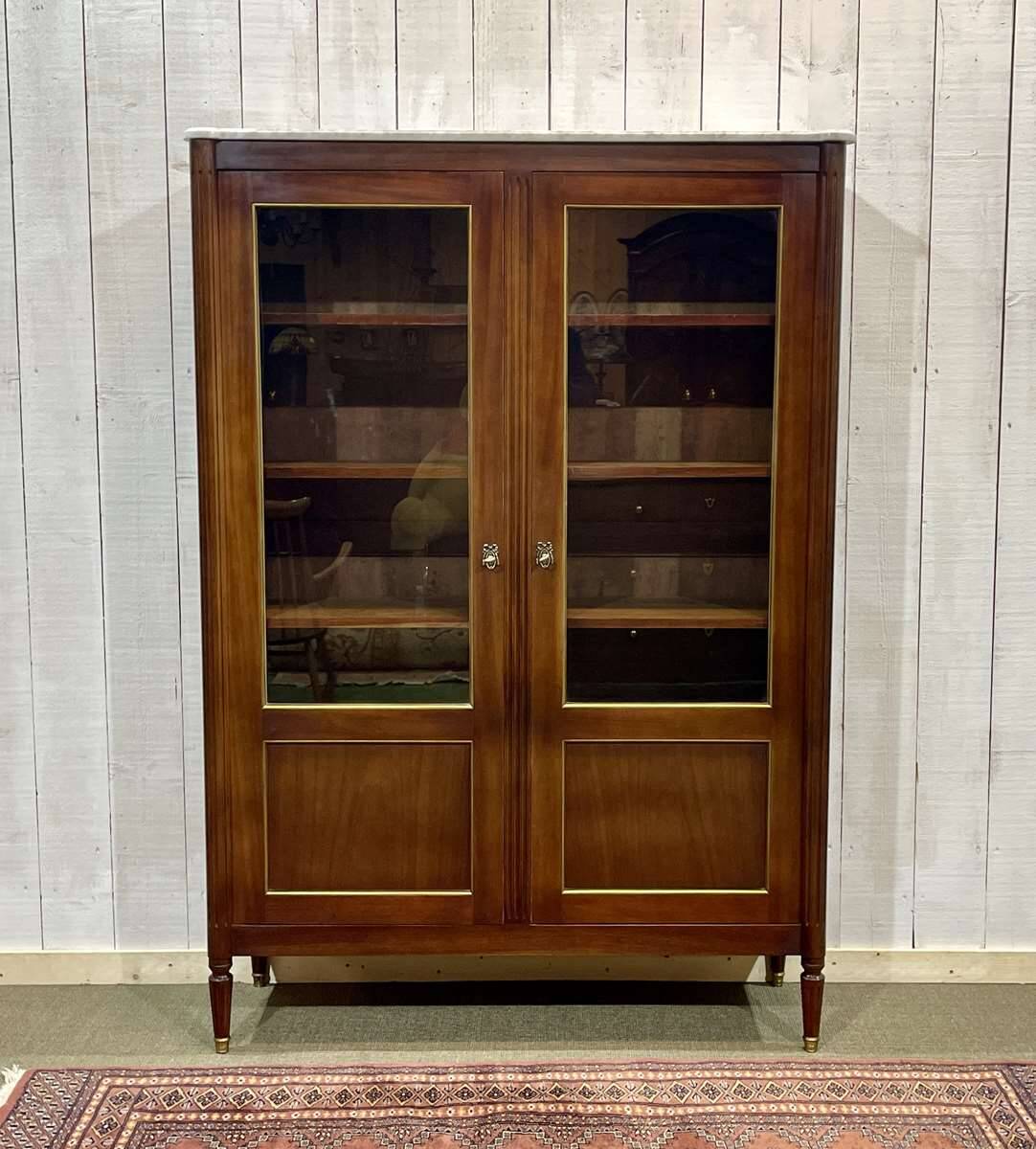 Louis XVI style bookcase in mahogany and marble top from the 70s