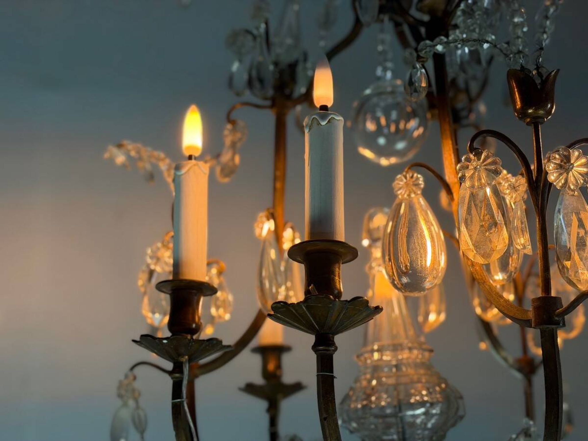 Bronze cage chandelier adorned with crystal drops, circa 1880