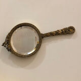 Hand mirror in gilded bronze