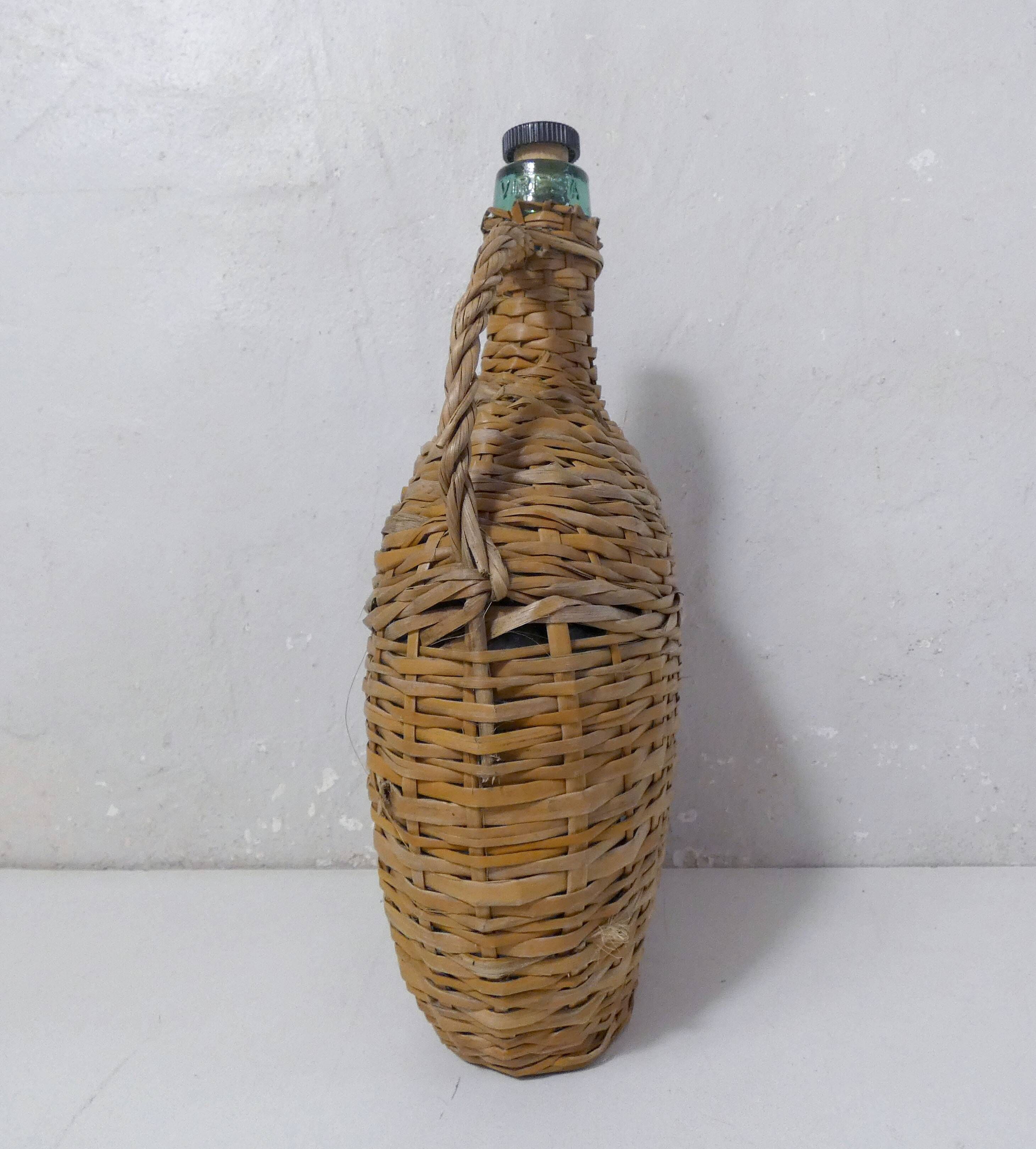 old bottle dressed in rattan vintage pilgrim gourd