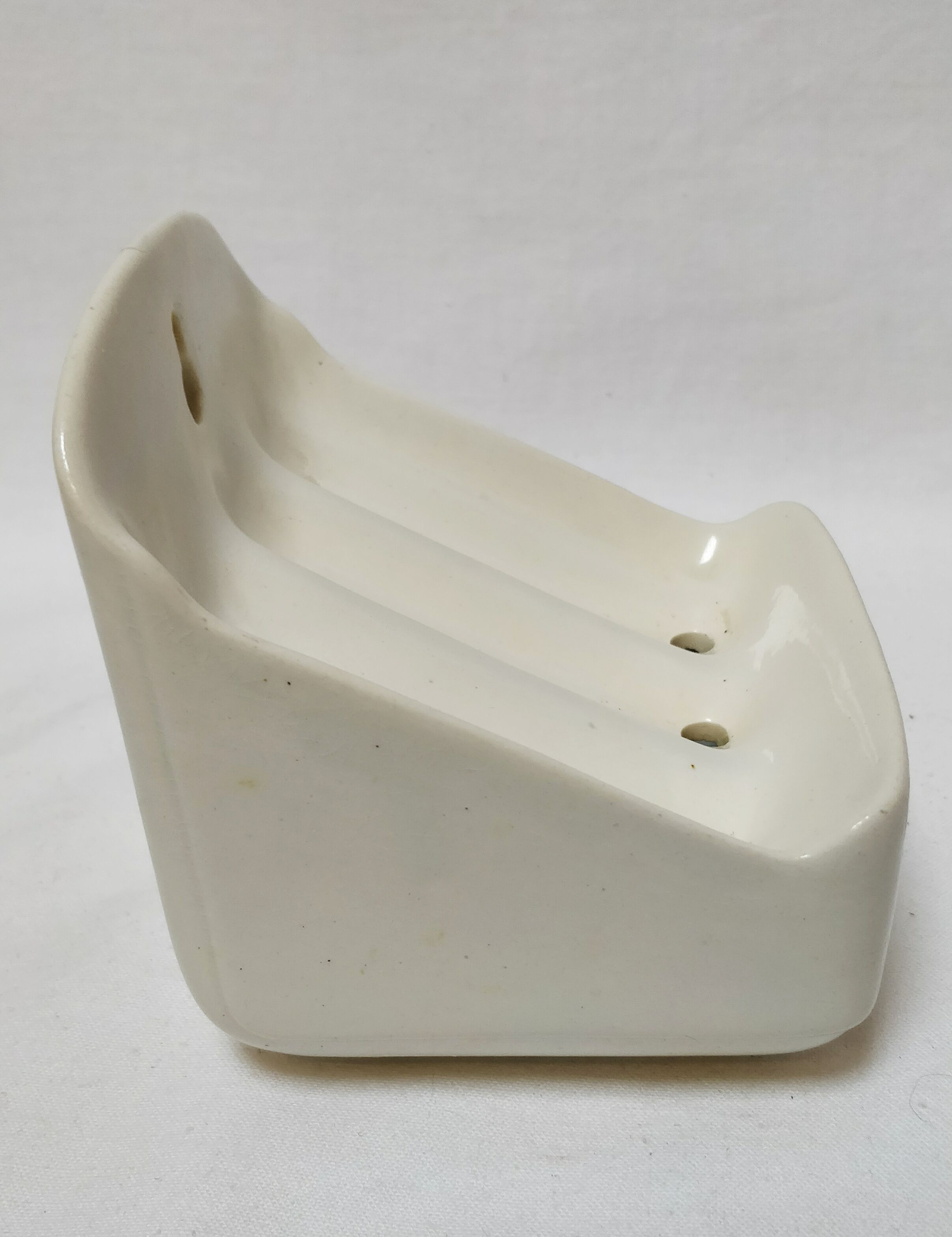 Wall-mounted ceramic soap holder
