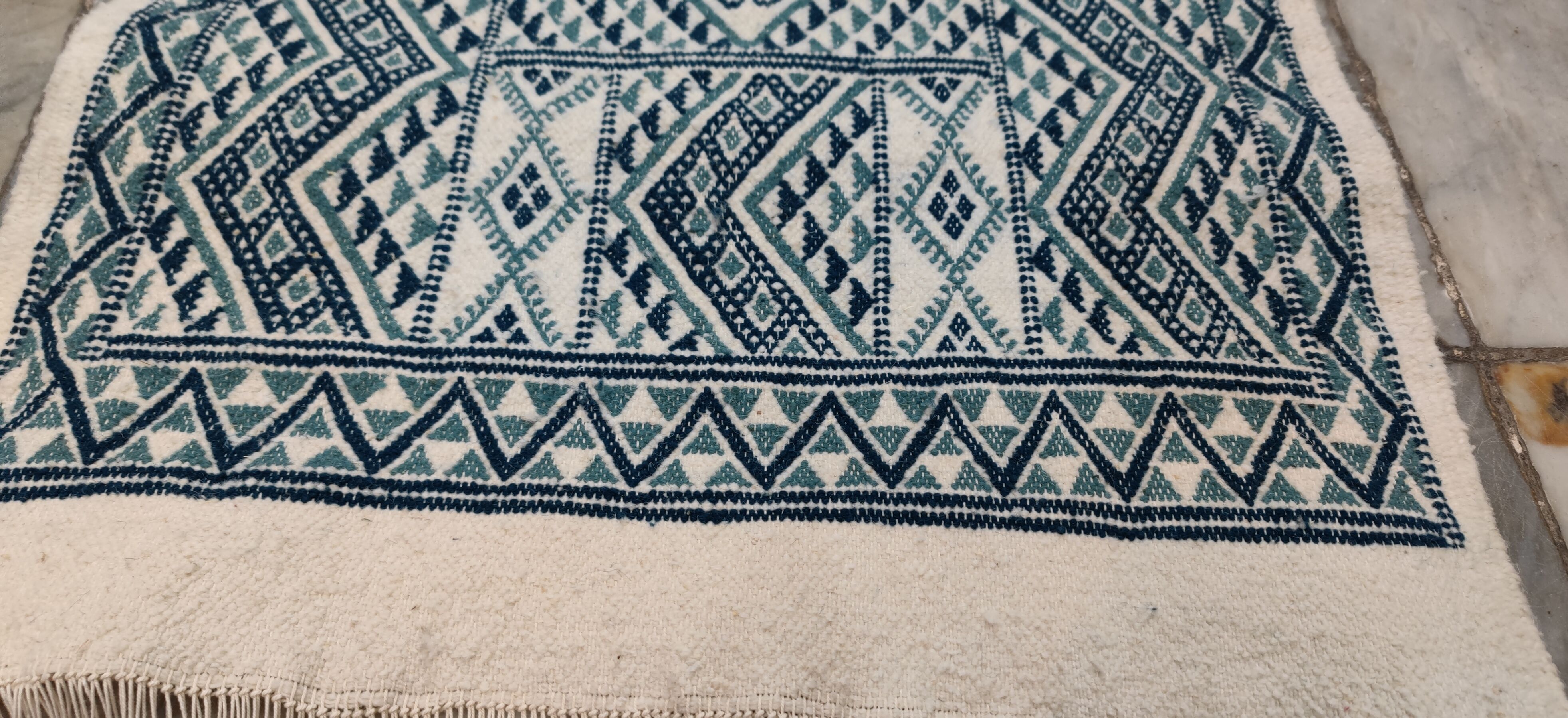 Handmade traditional white and blue carpet, 152x76 cm