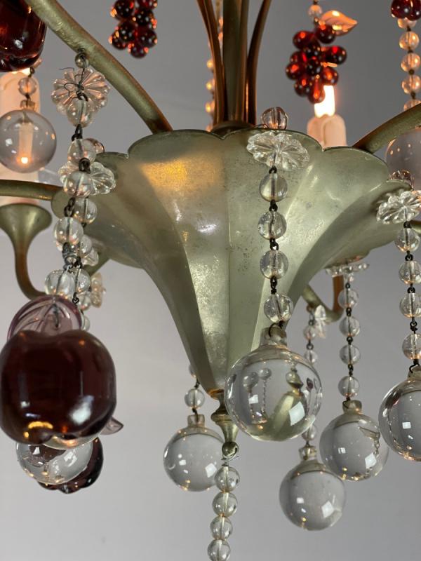 Silver bronze lustre garnished with pampilles, fruits and balls