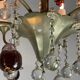 Silver bronze lustre garnished with pampilles, fruits and balls