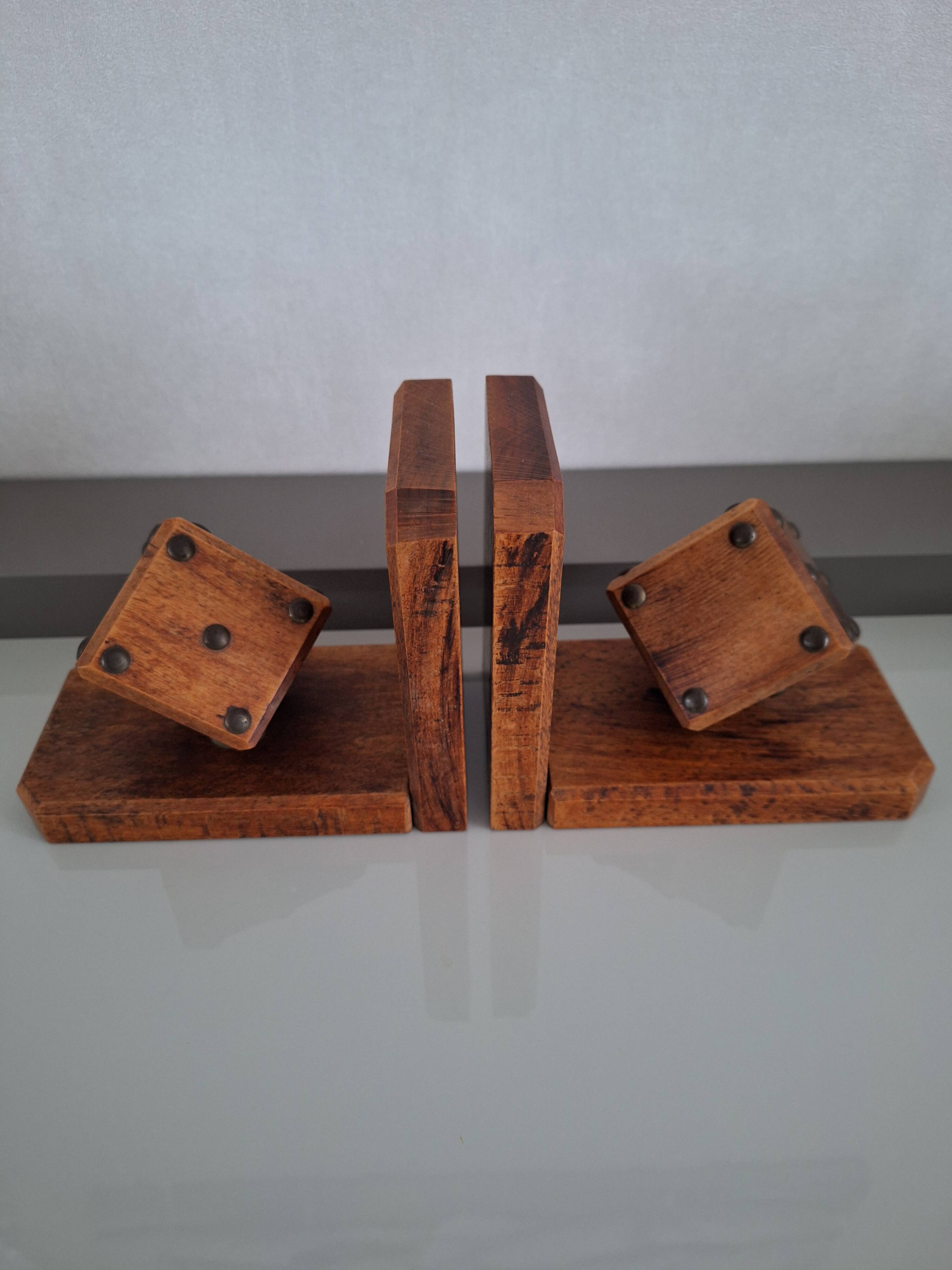 Pair of bookends with wooden dice