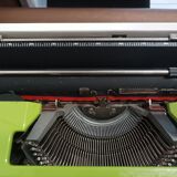 Green Underwood 315 typewriter with its briefcase