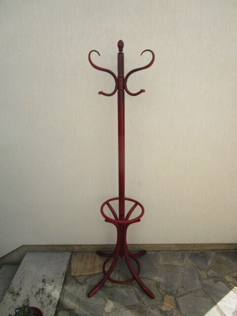 Old red parrot coat rack