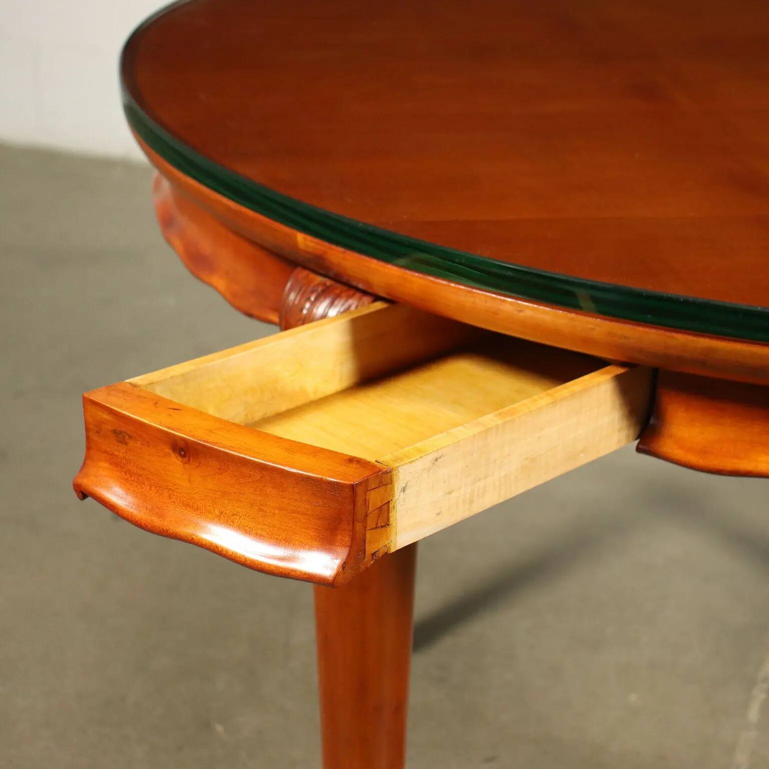 Table in solid beech, mahogany veneer and glass, Italy, 1950s.