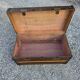 Old travel trunk in oilcloth