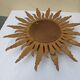Sun mirror in carved gilded wood from the 1950s