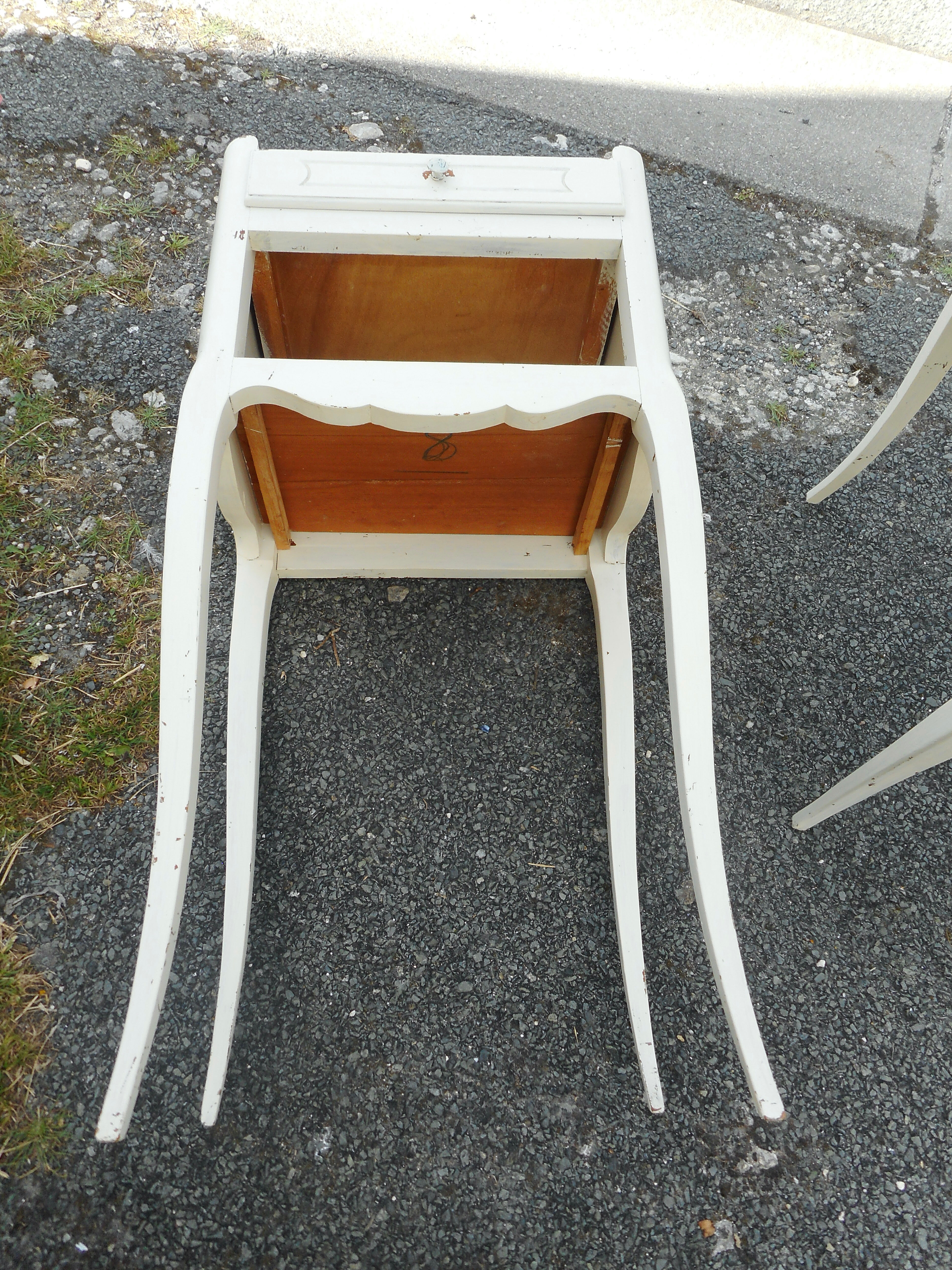 Pair of white lacquered bedside tables
