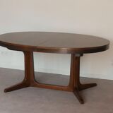 Scandinavian style oval table in central foot with extensions