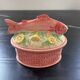 Fish terrine with lemon in a sauce.