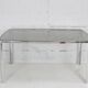 Living table. chrome metal, curved smoked glass slab, france, circa 1970.