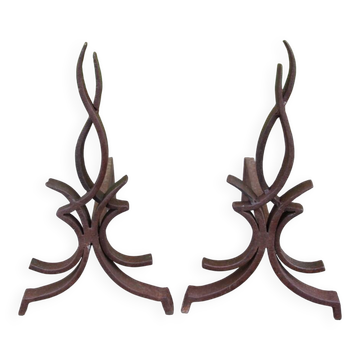 pair of andirons attributed to Raymond Subes, flame model