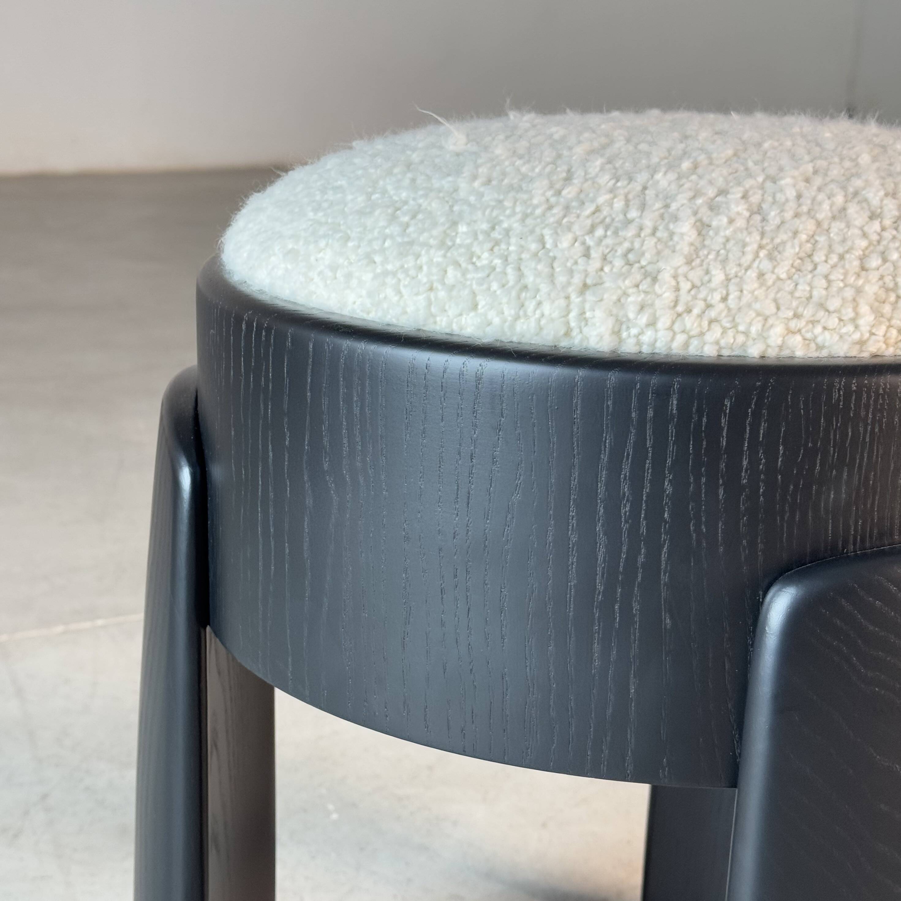 Sculptural Black Ash Wood Stool with Dedar Milano Bouclé Ivory by FORME