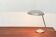 Mid-Century German table lamp model 6761 in metal by Christian Dell for Kaiser Leuchten, 1960s.