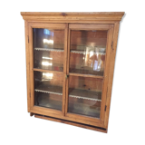 Suspended in early twentieth century tree window