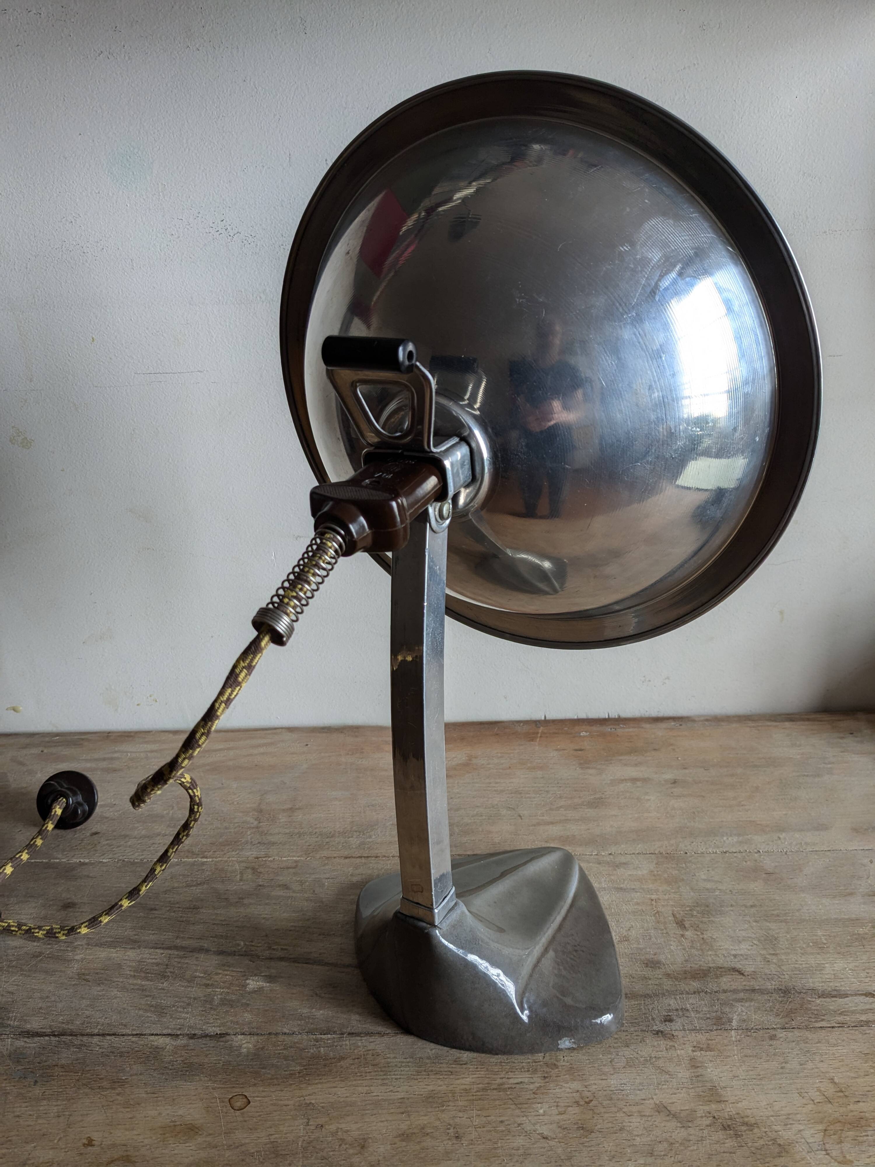 Cobra parabolic lamp with enameled cast iron base, Art Nouveau.