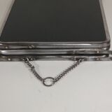 Tryptic barber's mirror