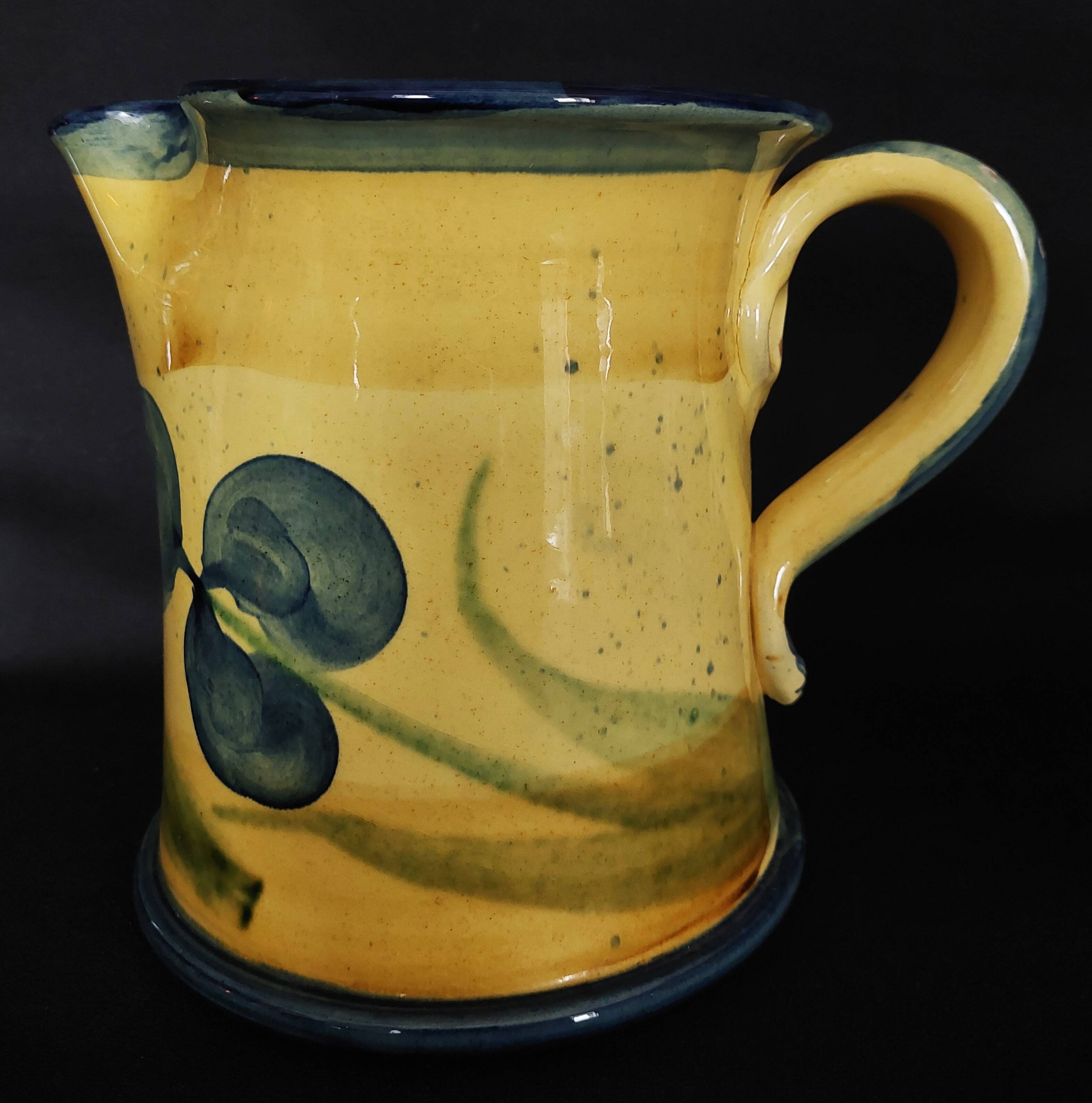 Vintage earthenware pitcher with a glossy finish, signature to be identified, 20th-century ceramics.