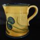 Vintage earthenware pitcher with a glossy finish, signature to be identified, 20th-century ceramics.
