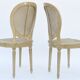 Pair of white canne and lay chairs