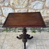 Tripod pedestal table in solid oak, richly carved and molded, 19th century