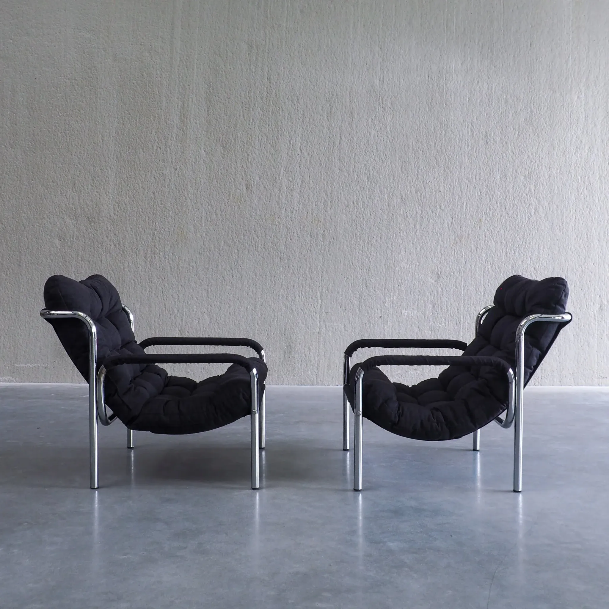 Pair of mid-century modern tubular lounge chairs
