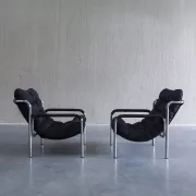 Pair of mid-century modern tubular lounge chairs